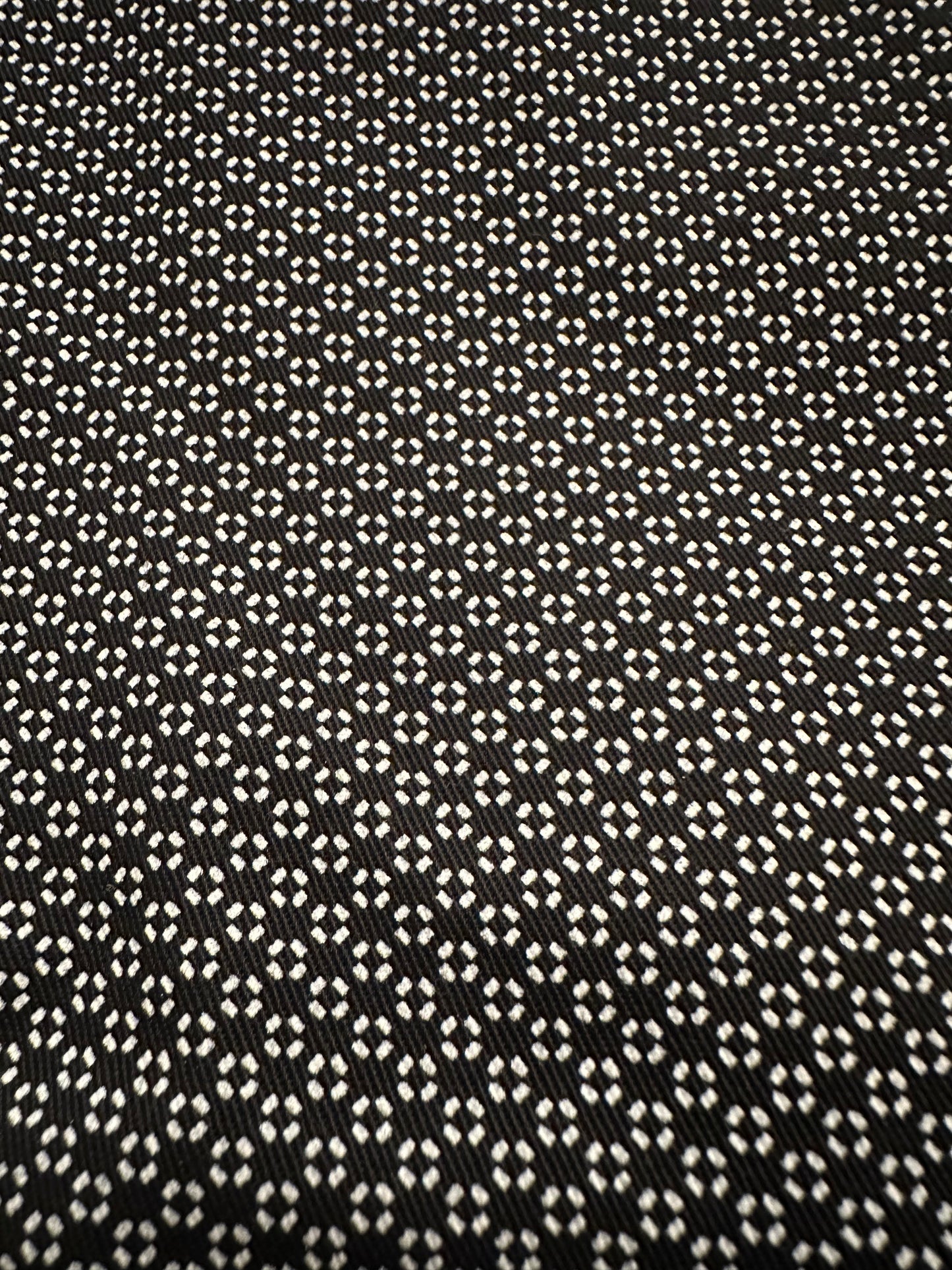 Durable black utility work shirt made from heavyweight cotton, featuring a relaxed fit and double chest pockets.